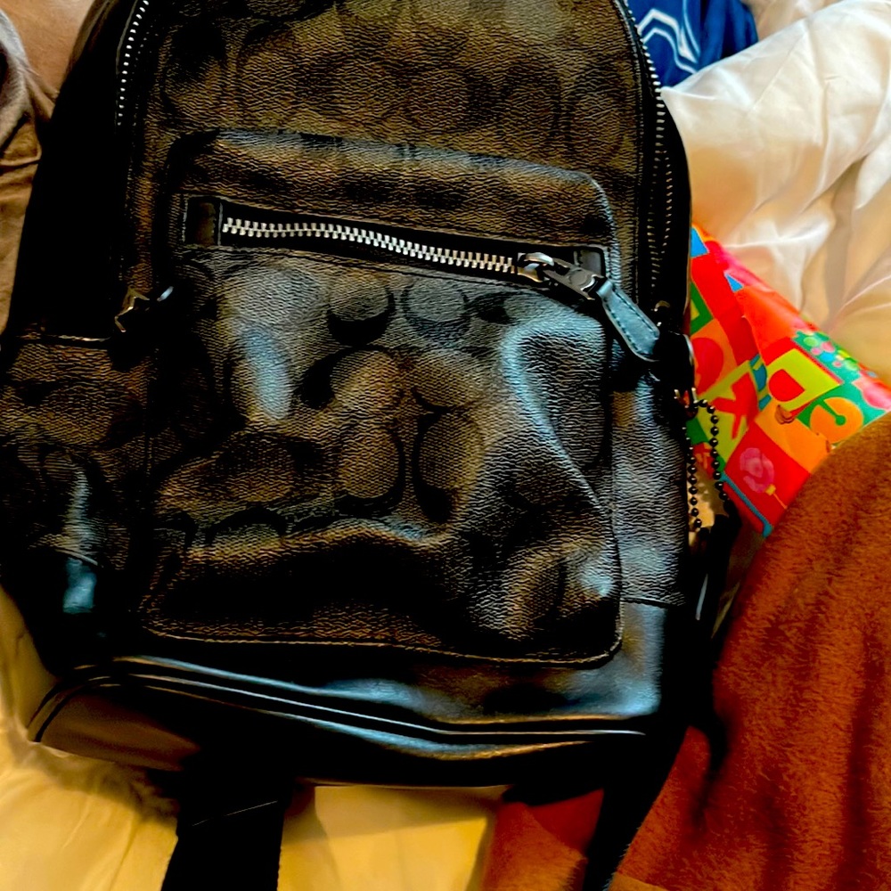It’s a man’s back/sideways coach nice brand new no tags